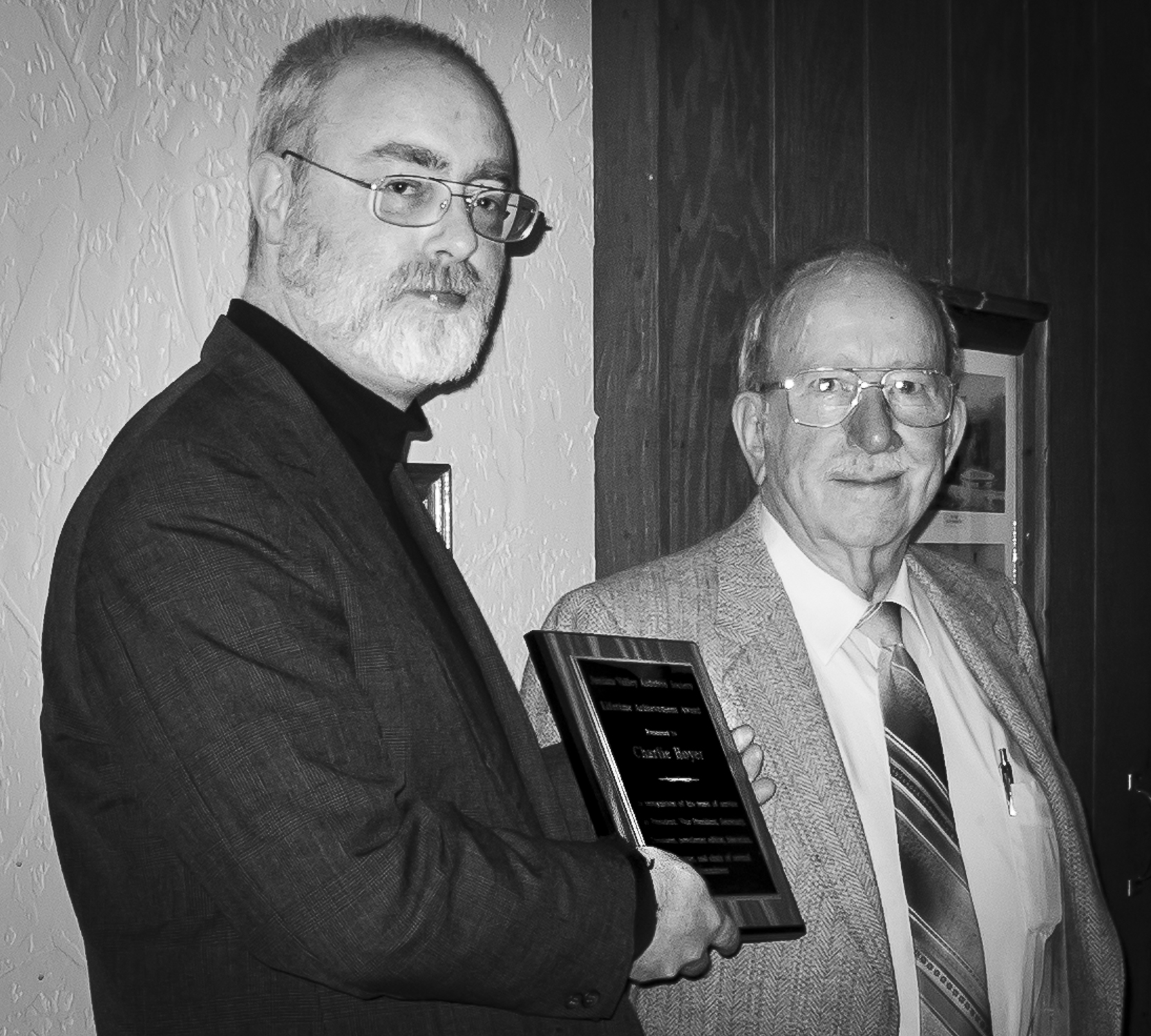 Charlie Hoyer accepting a plaque